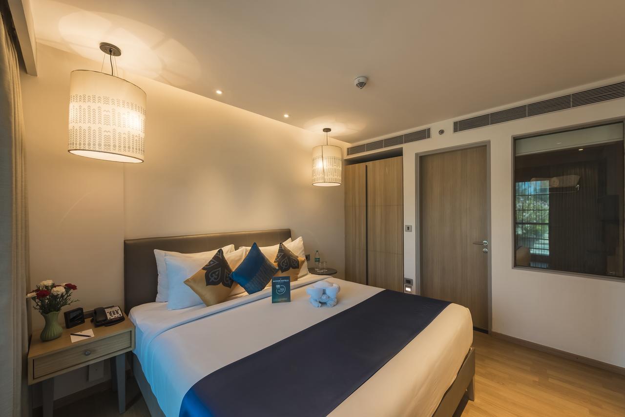 Grand Mercure Mysore - An Accor Brand Dış mekan fotoğraf A bedroom at the hotel